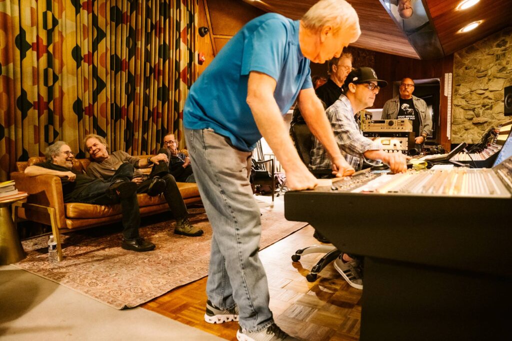 Musicians work on a recording in the control room of Historic Studio A at Capricorn Sound Studios on April 4.
