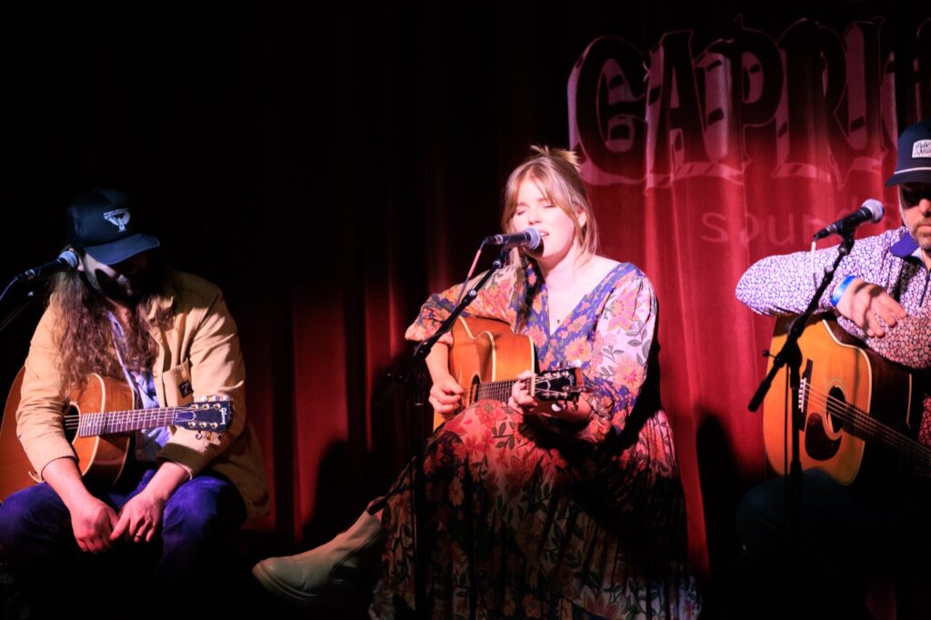 Musicians on stage at Capricorn
