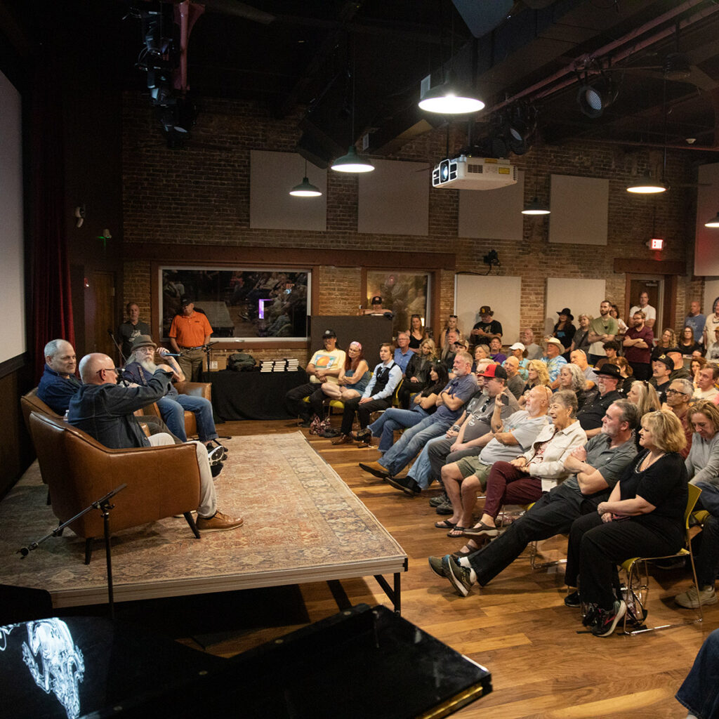 Photo of crowd at a panel event in Studio B